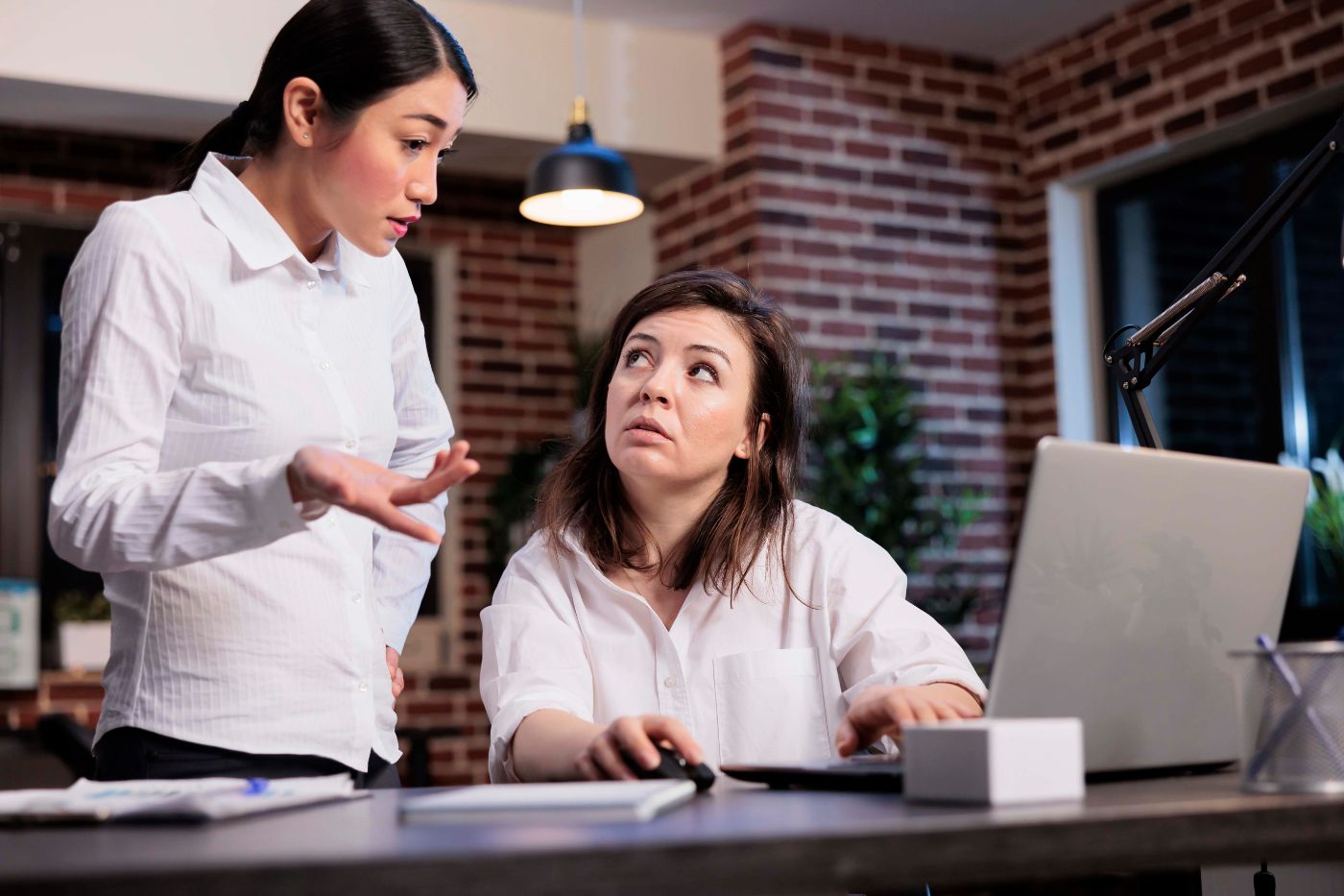 business-company-employees-office-workspace-discussing-about-startup-project-marketing-strategy-multiethnic-corporate-workers-analyzing-management-charts-while-using-laptop 